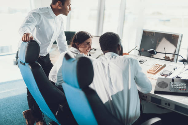 istock Air dispatcher team working in navigation room 1093988182