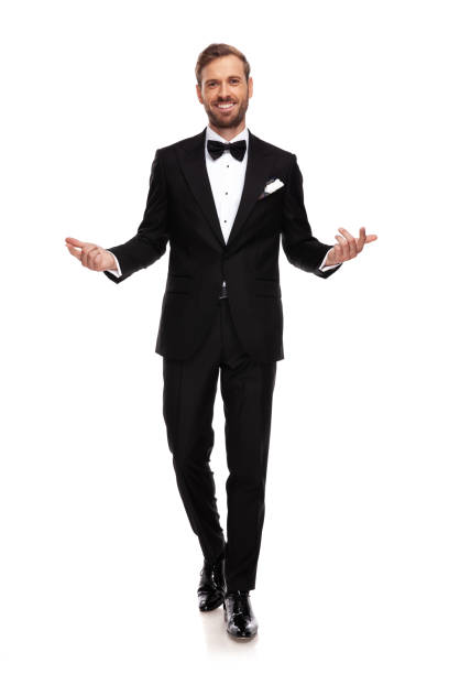 istock attractive businessman walks forward and makes hands gesture 1093989728