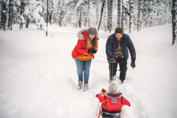 istock Happy family in snow 1093991992
