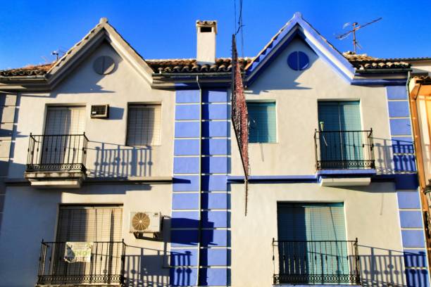 Colorful and majestic old house facade in Rute, Spain Rute, Cordoba, Spain- December 31, 2018: Colorful and majestic old house facade in Rute village, Cordoba province, Spain ancient creativity andalusia architecture stock pictures, royalty-free photos & images