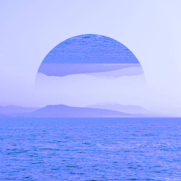 art collage with awesome view of nature with mountains and sea Aesthetic art collage with awesome view of nature with mountains and sea in  inversion blue colours and mirror reflection in circle frame. vaporwave photos stock pictures, royalty-free photos & images
