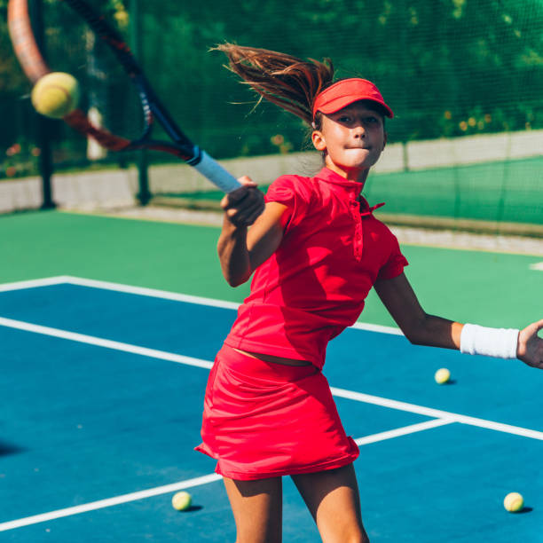 istock Girl Playing Tennis 1093992928