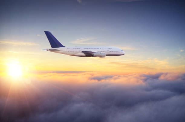 istock Huge two-storey passengers airplane above clouds 1093993602