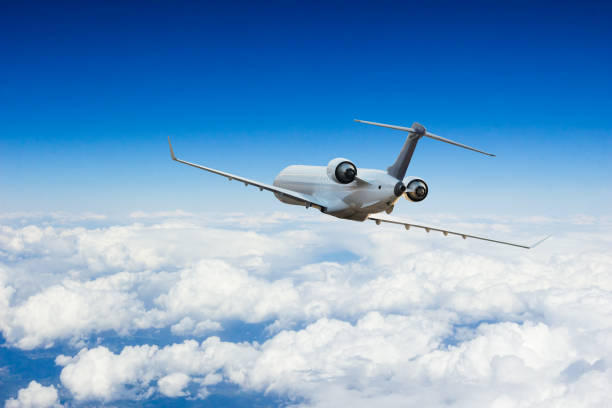 istock Passengers commercial airplane flying above clouds 1093993718