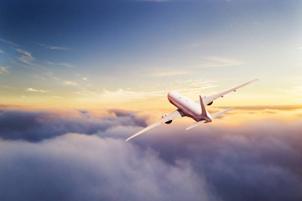 istock Passengers commercial airplane flying above clouds 1093993992