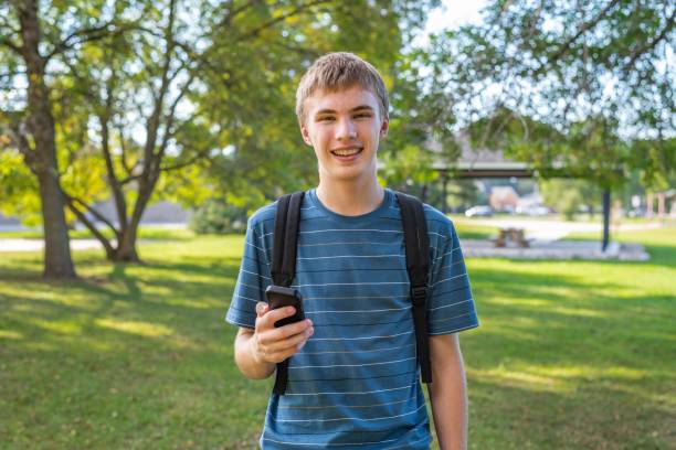 istock Teenager on his cellphone. 1093996242
