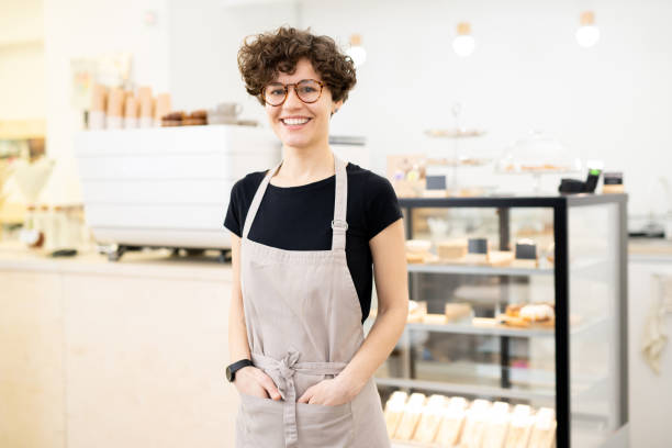 istock Cheerful lady barista 1093997106