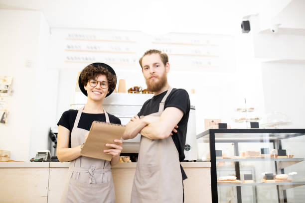 istock Confident team of coffee shop 1093997124