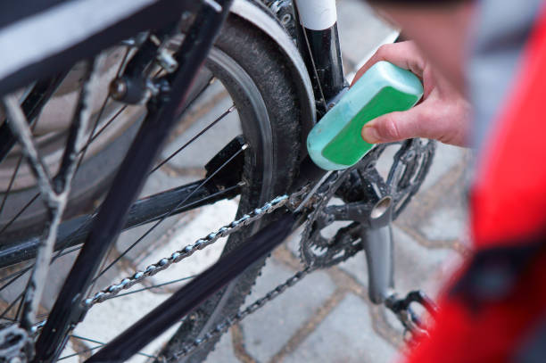 to take care of the bike, maintenance of the Bicycle, to lubricate parts and clean stock photo