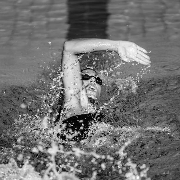 istock Woman Swimming In Pool 1094002856