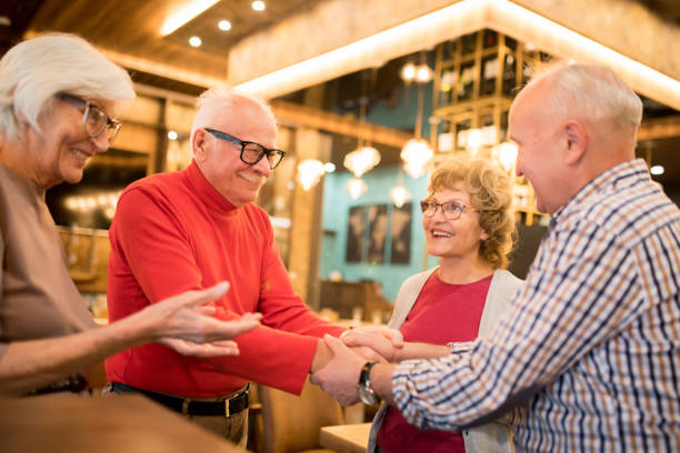 Ladies introducing their husbands to each other