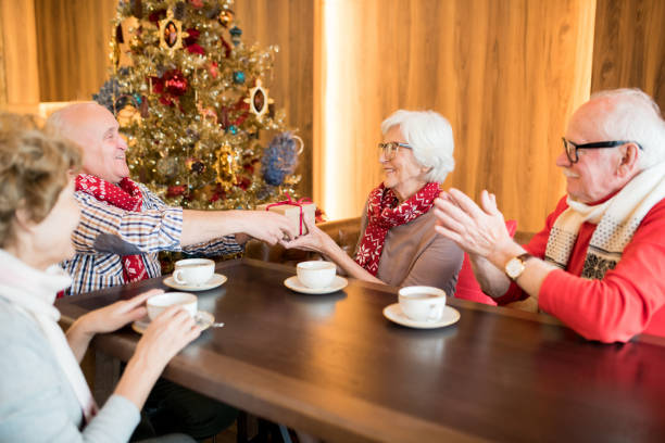 istock Congratulating senior lady on Christmas 1094005646
