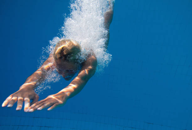 istock Woman Swimming In Pool 1094006598