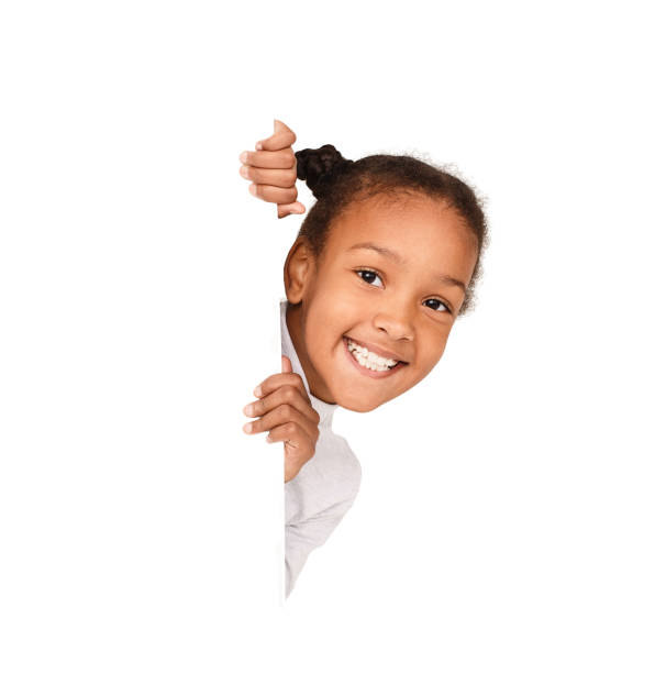 istock African-american girl peeking out from empty banner 1094006966