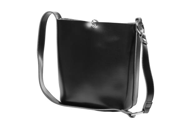 istock elegant black female bag with a long handle, on a white background 1094007766