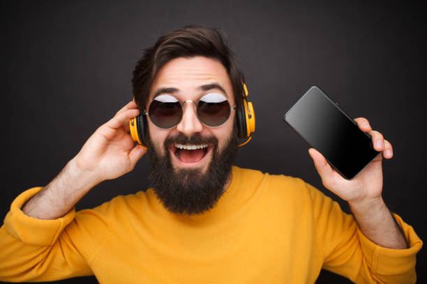 istock Trendy male model with gadgets 1094012850