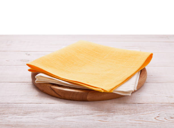 Pizza board, with napkin on wooden table isolated. Top view mockup