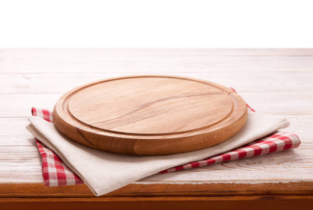 istock Pizza board, with napkin on wooden table isolated. Top view mockup 1094015066