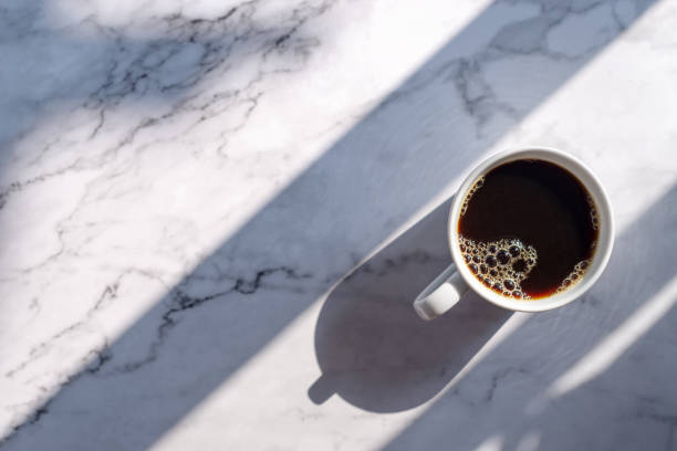 istock a cup of coffee on marble table 1094018570