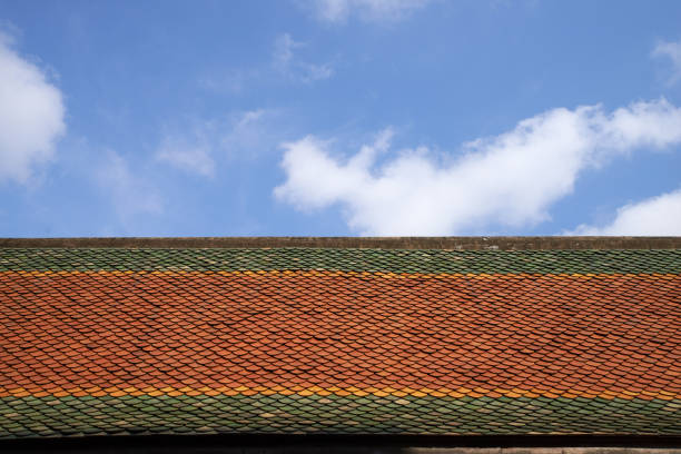istock Red and green roof , blue sky and white cloud 1094023948