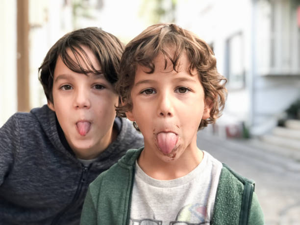 istock Happy brothers playing outdoors 1094030042