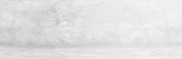 istock gray cement wall studio and blank floor background for present product 1094030258