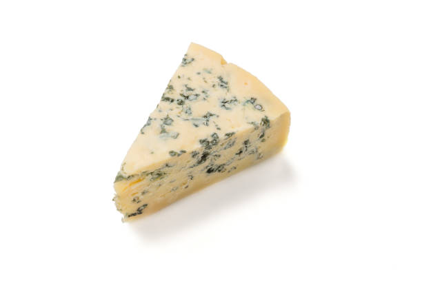 istock Wedge of soft blue cheese with mold isolated on white background. 1094031330