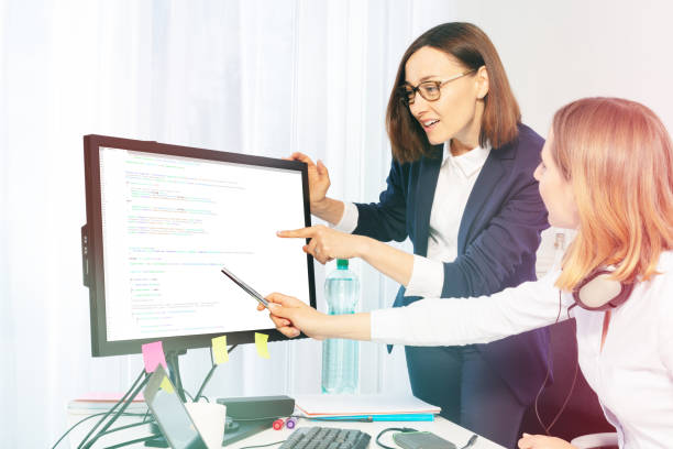 istock Women discussing business project in the office 1094034606