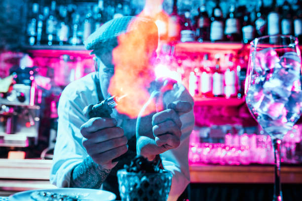 istock Expert barman is making cocktail at night club. 1094035932