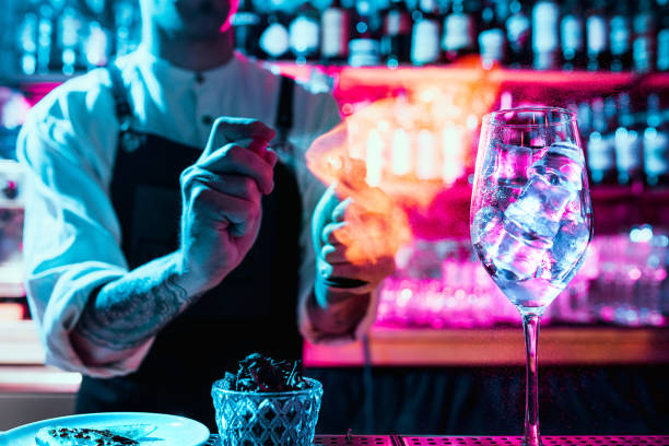 istock Expert barman is making cocktail at night club. 1094035946