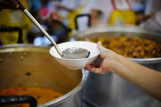 istock Serving the Homeless Hungry and Poor 1094037620