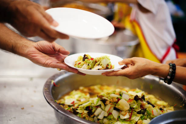 istock Serving the Homeless Hungry and Poor 1094037674