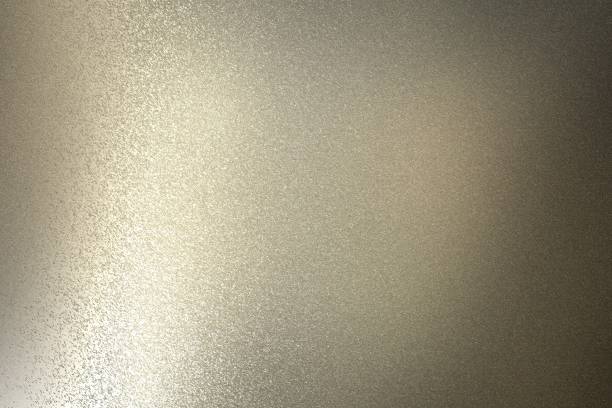 istock Light shining on rough dark brown metal wall texture, abstract background 1094041038