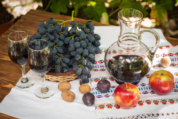 istock Wine in glasses with bunch of grape. 1094048232