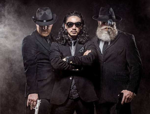 istock Asian Gangster Man with bodyguards 1094054616
