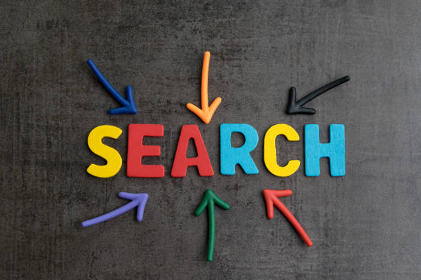 istock Search concept, best way finding website and content from the internet, result by SEO ranking, arrows pointing to word SEARCH at the center of cement wall chalkboard 1094054676