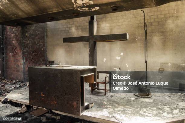 Beautiful Altar And Huge Cross In A Church Or Chapel Destroyed By Fire Ruins Of A Recent Burned Religious Place Power Of Fire Stock Photo - Download Image Now