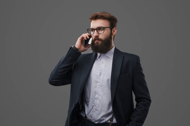 istock Confident businessman speaking on phone 1094061904
