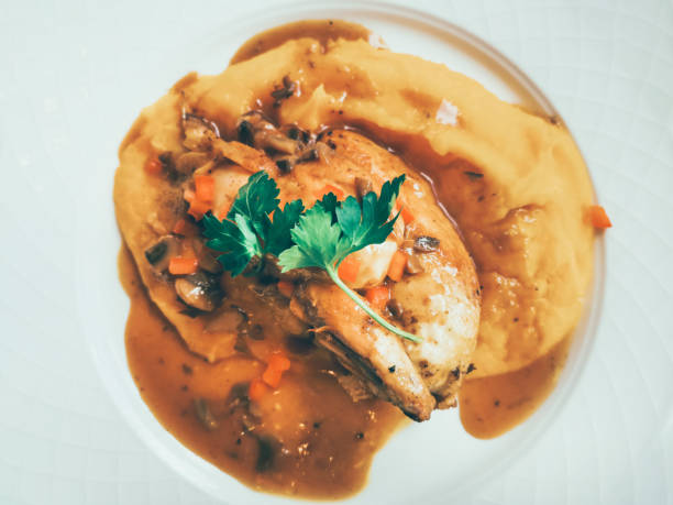 istock roasted sleeves chicken with potatoes and barbecue sauce 1094062326