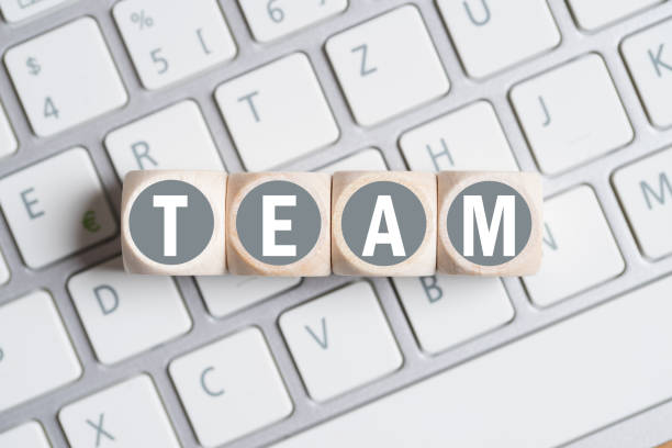 istock cubes with letters forming the word TEAM on a keyboard 1094065066