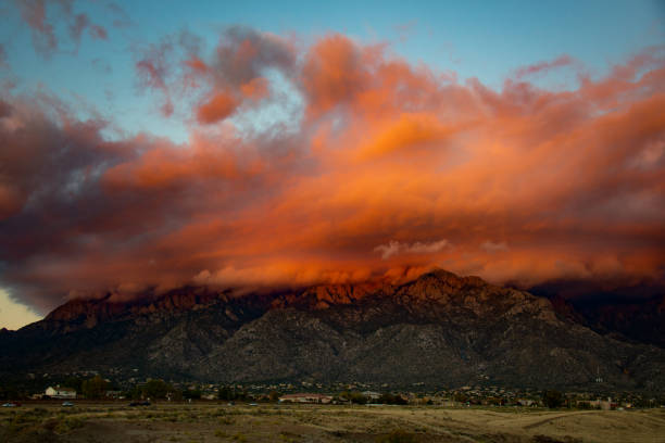 istock Sandia Mountains with Majestic Sky and Clouds 1094065356
