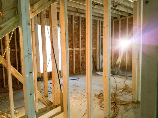 istock View of wooden framework inside new construction home site. 1094065452