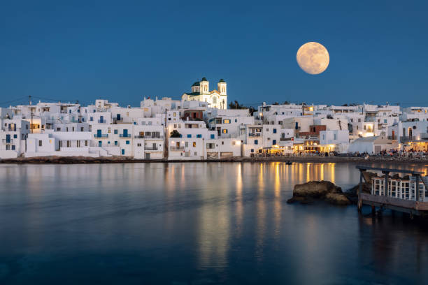 August full moon over the idyllic village of Naousa, Paros August summer full moon over the idyllic village of Naousa on on the island of Paros, Cyclades, Greece paros stock pictures, royalty-free photos & images