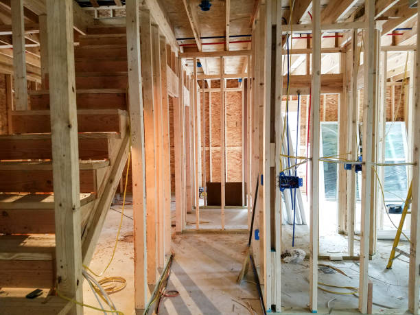 istock Unfinished staircase inside new construction home site. 1094065508