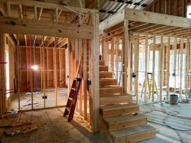 istock Unfinished staircase inside new construction home site. 1094065594