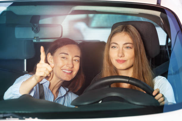 istock Woman pointing finger on something sitting in car 1094067456