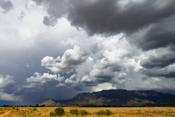 istock Sandia Mountains with Majestic Sky and Clouds 1094074576