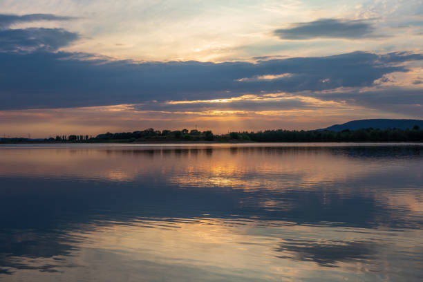 istock Sunset on a lake in Hohenrode in Germany 1094074596