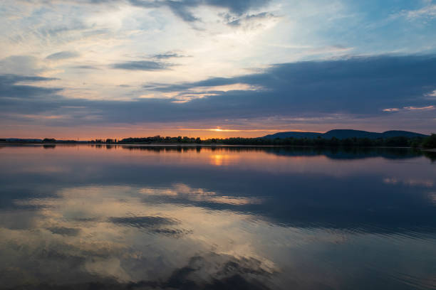 istock Sunset on a lake in Hohenrode in Germany 1094074626