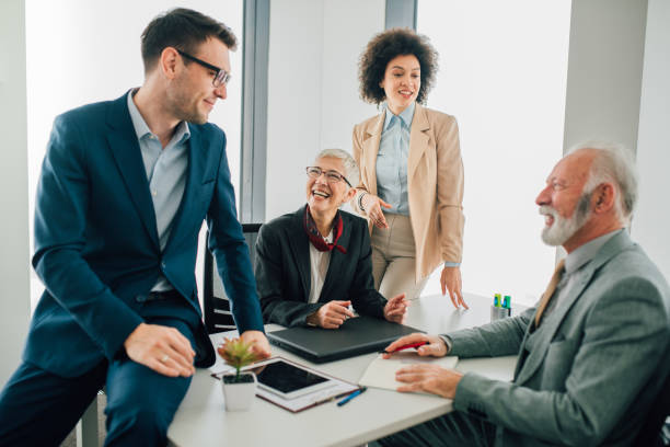 istock Happy coworkers at office 1094077262